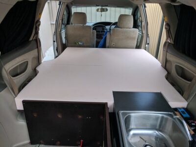 Shows inside the van with custom cut foam matress bed in place